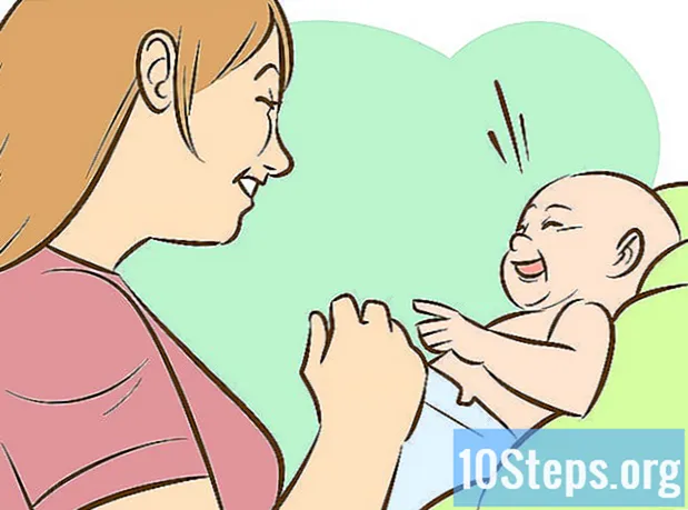 Hvordan få en baby til å le