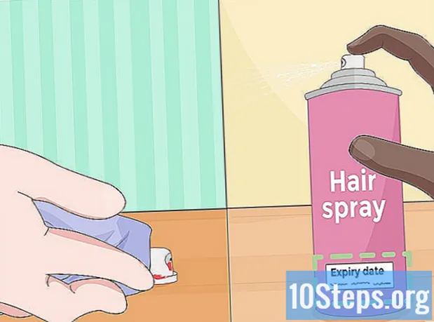 Hvordan rengjøre dysen på en sprayboks