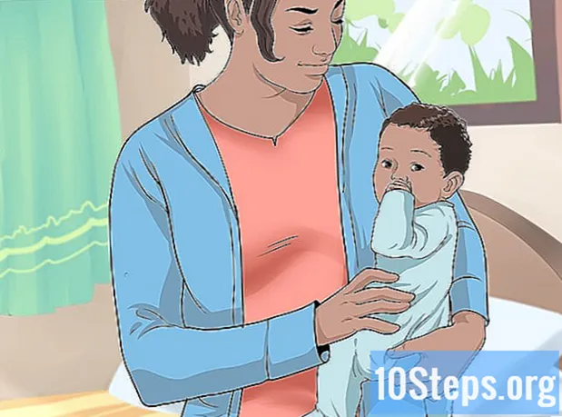 Cómo sostener a un bebé