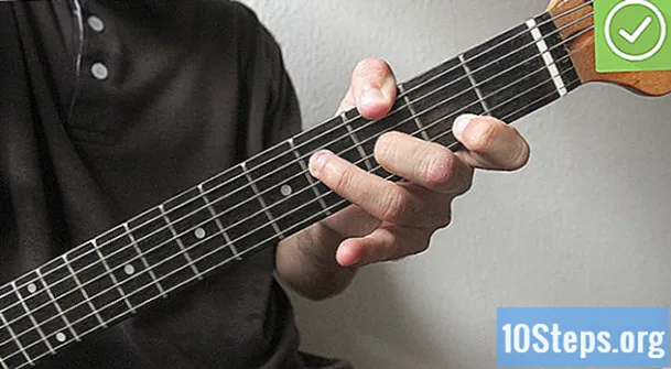 Cómo tocar acordes de pestañas en la guitarra