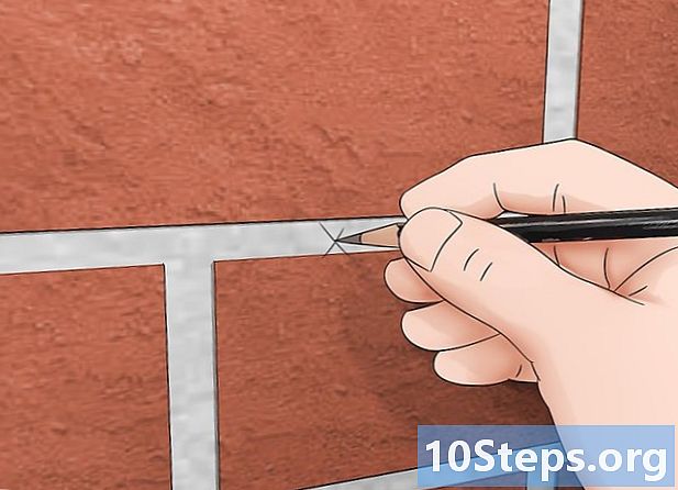 Cómo colgar objetos en una pared de ladrillos