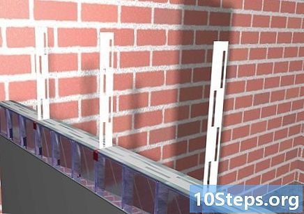 Kaip pastatyti sieną su stiklo blokais