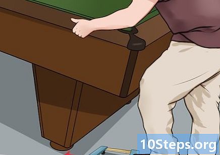 Как да преместите билярдна маса
