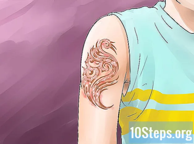 Hoe een slechte tatoeage te repareren