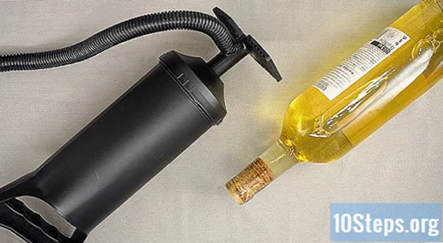 Sådan åbner du en flaske uden en flaskeåbner - Kundskaber