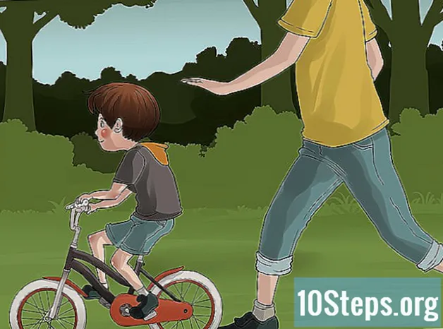 Como ensinar seu filho a pedalar uma bicicleta