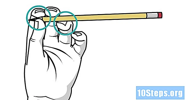 كيفية تدوير قلم رصاص حول الإصبع الأوسط