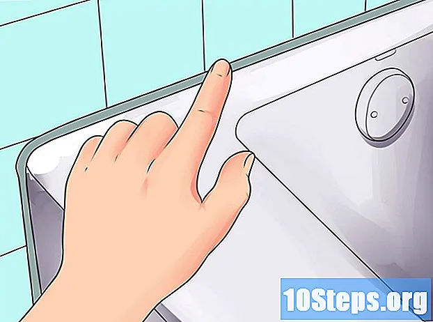 Hur man tätar ett handfat eller ett badkar med silikon